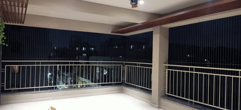 Terrace protected by invisible grills at night