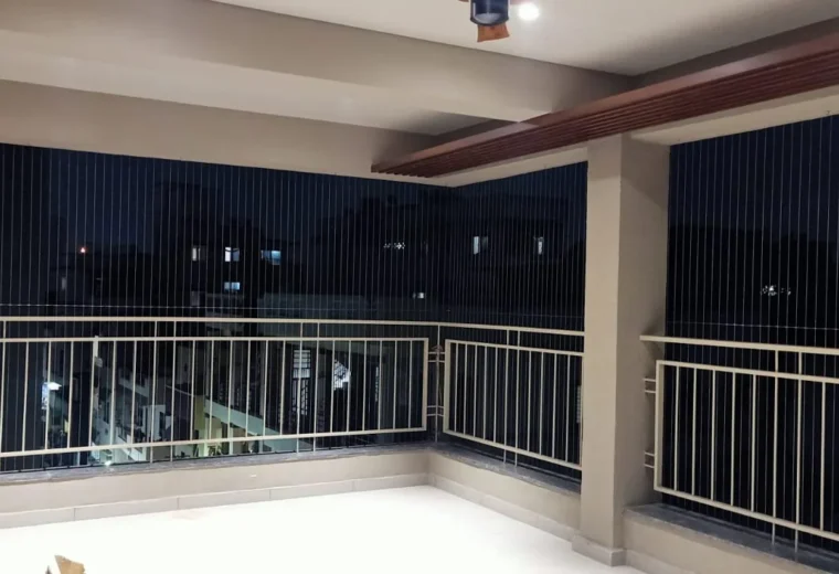 Terrace protected by invisible grills at night